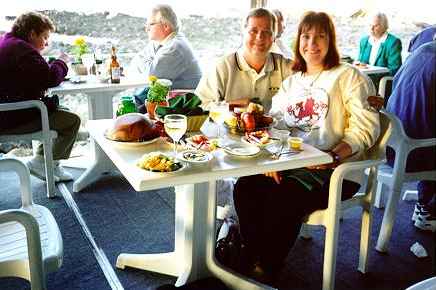 Bruce and Cheryl at a restaurant on their honeymoon